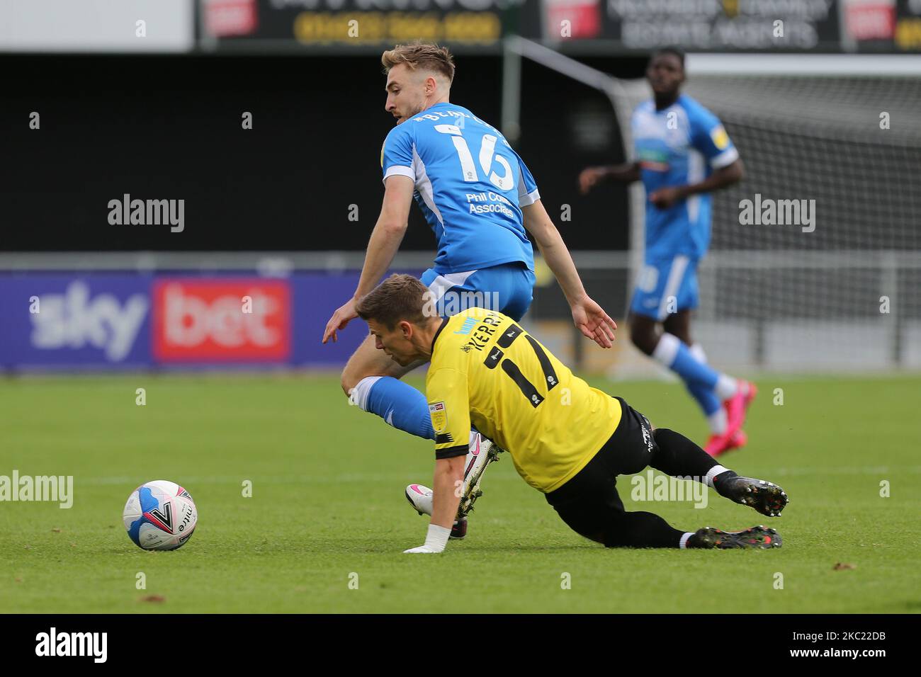 Tom Beadling of Barrow in action with Harrogate Town's Lloyd Kerry during the Sky Bet League 2 match between Harrogate Town and Barrow at Wetherby Road, Harrogate, England on 17th October 2020. (Photo by Mark Fletcher/MI News/NurPhoto) Stock Photo