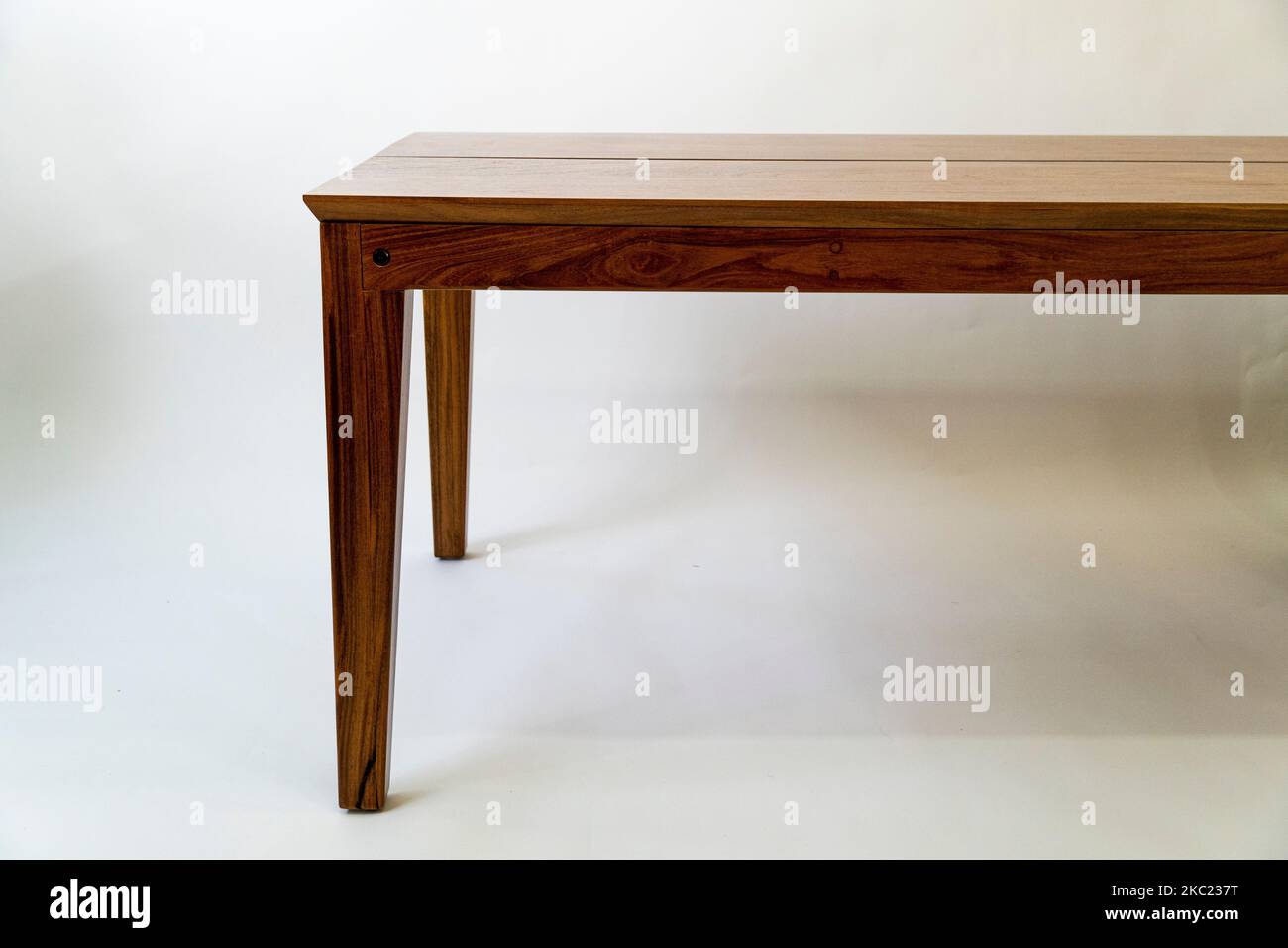 Detail of a wooden glued joint of a chairs leg. Material used for the