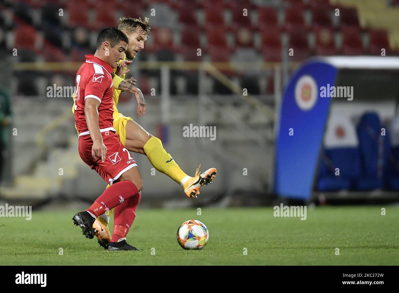 Denis Dragus of Romania U21 in action against Christian Gauci of Malta U21 during the soccer match between Romania U21 and Malta U21 of the Qualifying Round for the European Under-21 Championship 2021, in Giurgiu, Romania, on 13 October 2020. (Photo by Alex Nicodim/NurPhoto) Stock Photo