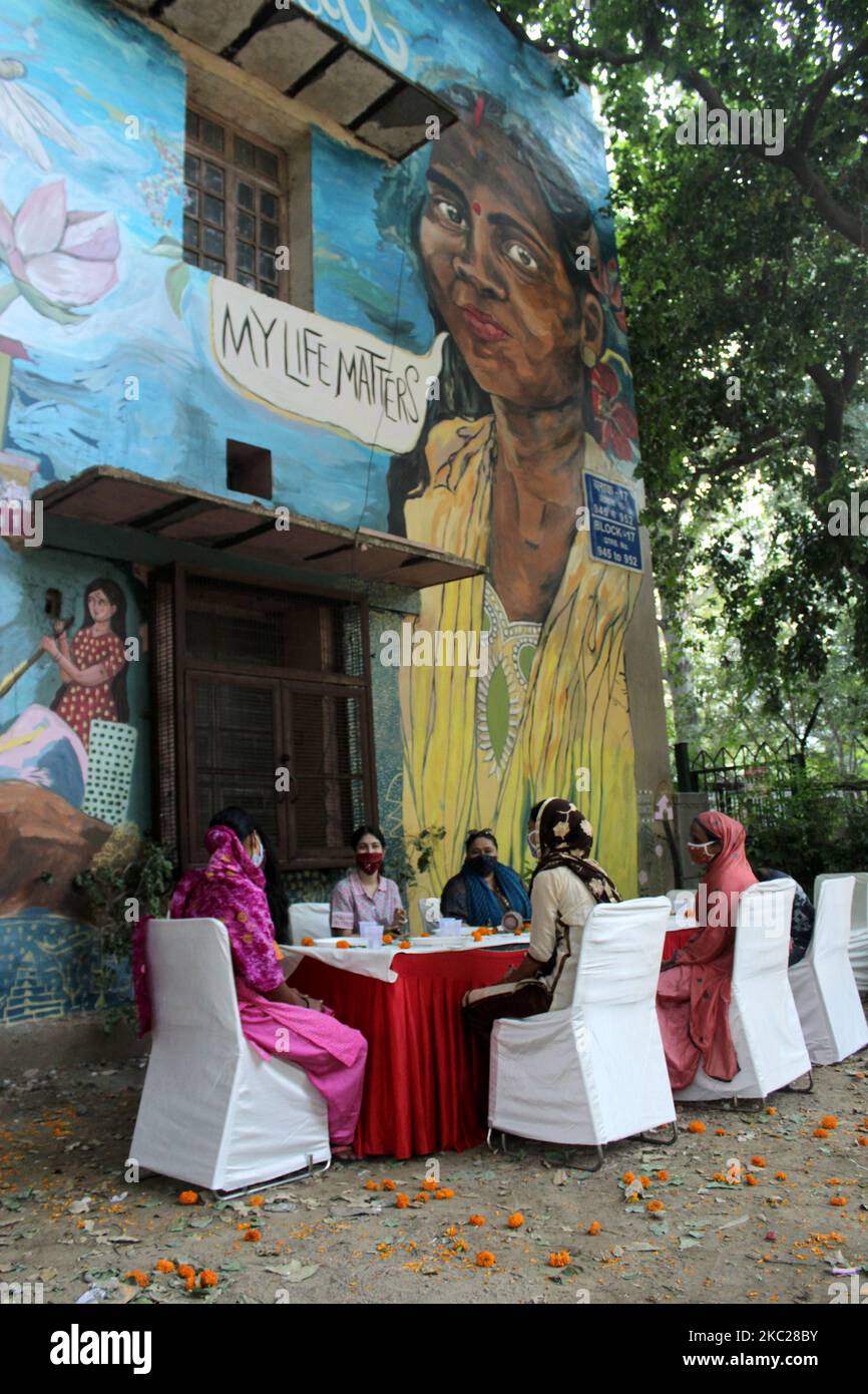 Shilo Shiv Suleman-street artist and founder 'The Fearless Collective' along with Chintan, an environmental research group organized an event for essential workers belonging to Dalit and Muslim community who work as waste-pickers in Delhi on completion of a mural on the facade of a Jor Bagh apartment building on October 20, 2020 in New Delhi, India. The Fearless Collective was started by Suleman in 2012, to create public art interventions with women & misrepresented communities across the world. (Photo by Mayank Makhija/NurPhoto) Stock Photo