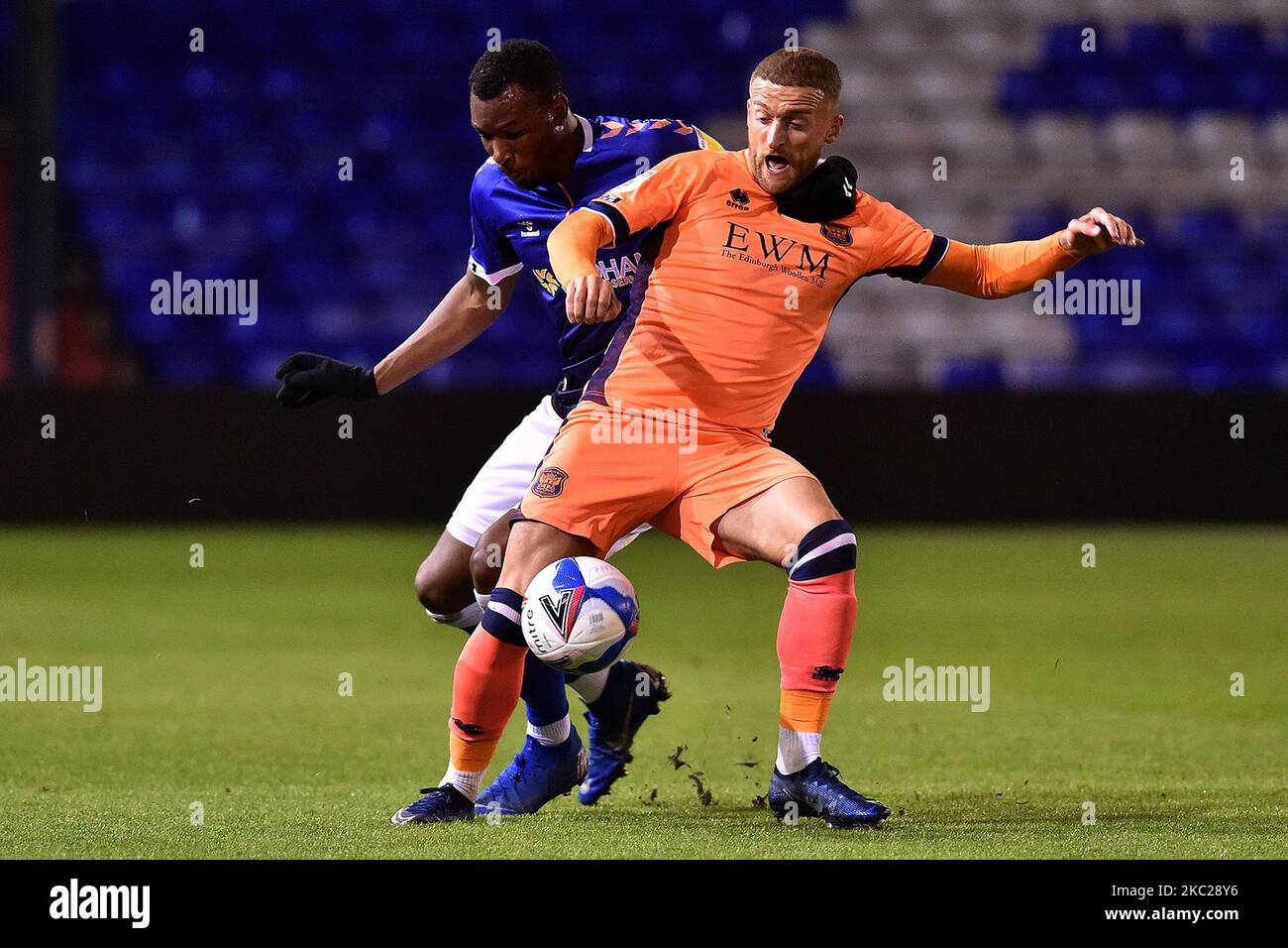 Oldham Athletic's Brice Ntambwe and Carlise United's Lewis Alessandra in action during the Sky Bet League 2 match between Oldham Athletic and Carlise United at Boundary Park, Oldham on Tuesday 20th October 2020. (Photo by Eddie Garvey/MI News/NurPhoto) Stock Photo