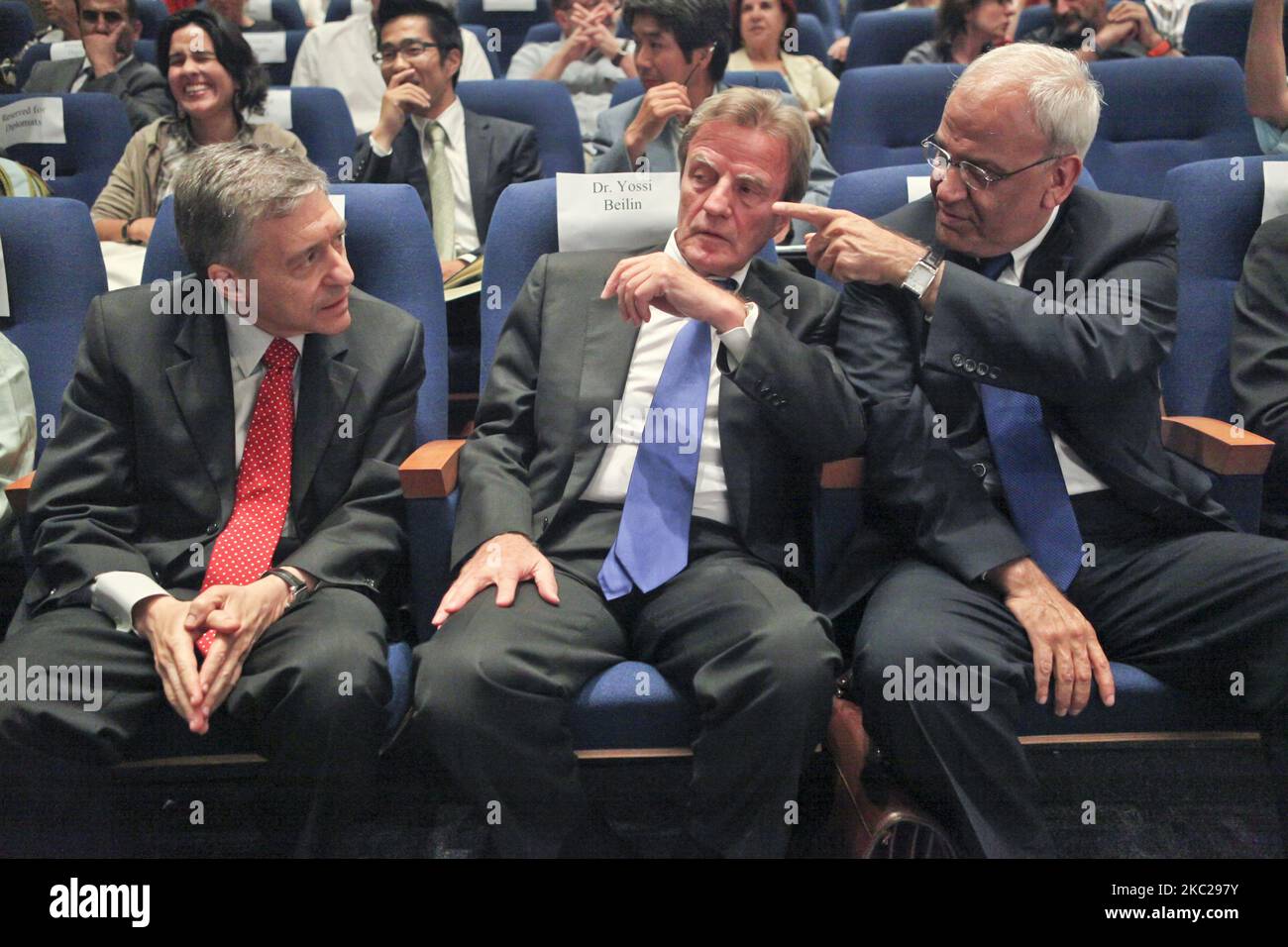 Senior Palestinian politician and diplomat and top PLO official Saeb Erekat (right) talking with former Israeli government minister Yossi Beilin (left) and former French foreign minister and co-founder of Médecins Sans Frontières Bernard Kouchner (center) at a conference organized by the Geneva Initiative organization in Tel Aviv, Israel, on 16 May, 2011. Senior Palestinian politician and diplomat and top PLO official Saeb Erekat is in critical condition with COVID-19 after he was hospitalized at Israel's Hadassah Medical Center in Jerusalem on Sunday, 18 October, 2020. (Photo by Mati Milstein Stock Photo