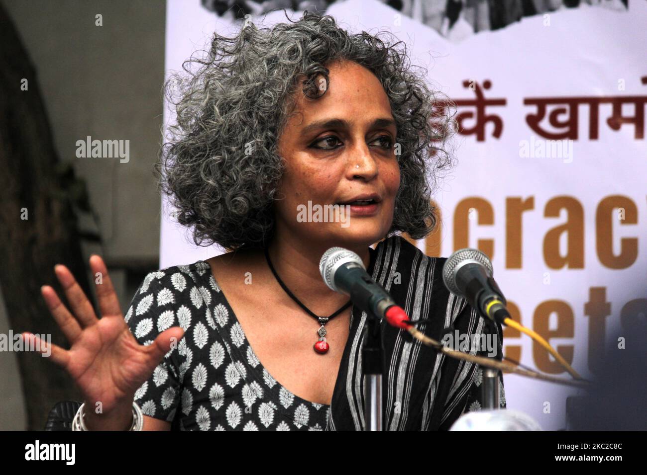 Internationally acclaimed author and activist Arundhati Roy speaks during a press conference on the Supreme Court's recent opinion on public protests, in which it said public places can't be occupied indefinitely in context of Shaheen Bagh, in New Delhi on October 22, 2020. The panel including eminent activists and people from civil society condemned the criminalization of right to peaceful public protest in a democracy. (Photo by Mayank Makhija/NurPhoto) Stock Photo