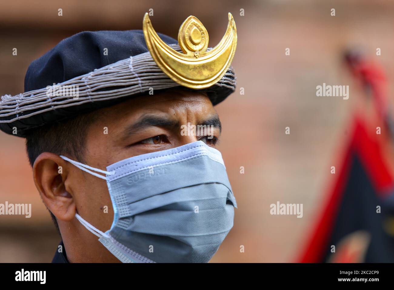 Nepal Army personal wearing facial mask attend the Fulpati procession marking the seventh day of the Dashain festival in Kathmandu, Nepal on October 23, 2020. Dashain festival is the longest and the most auspicious festival held in honour of the goddess Durga, commemorates the victory of the gods over the demons. (Photo by Sunil Pradhan/NurPhoto) Stock Photo