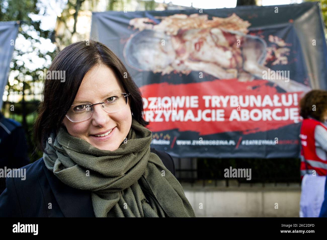 Kaja Godek, key anti-abortion activist next to her organisation's banners with fetuses. The Constitutional Court was deciding to ban abortions for fetal indications, in Warsaw, Poland, on October 22, 2020. Outside of the the court activists from both sides gathered in prayers for the judges to introduce the ban or in protest against limiting women reproductive rights. (Photo by Piotr Lapinski/NurPhoto) Stock Photo