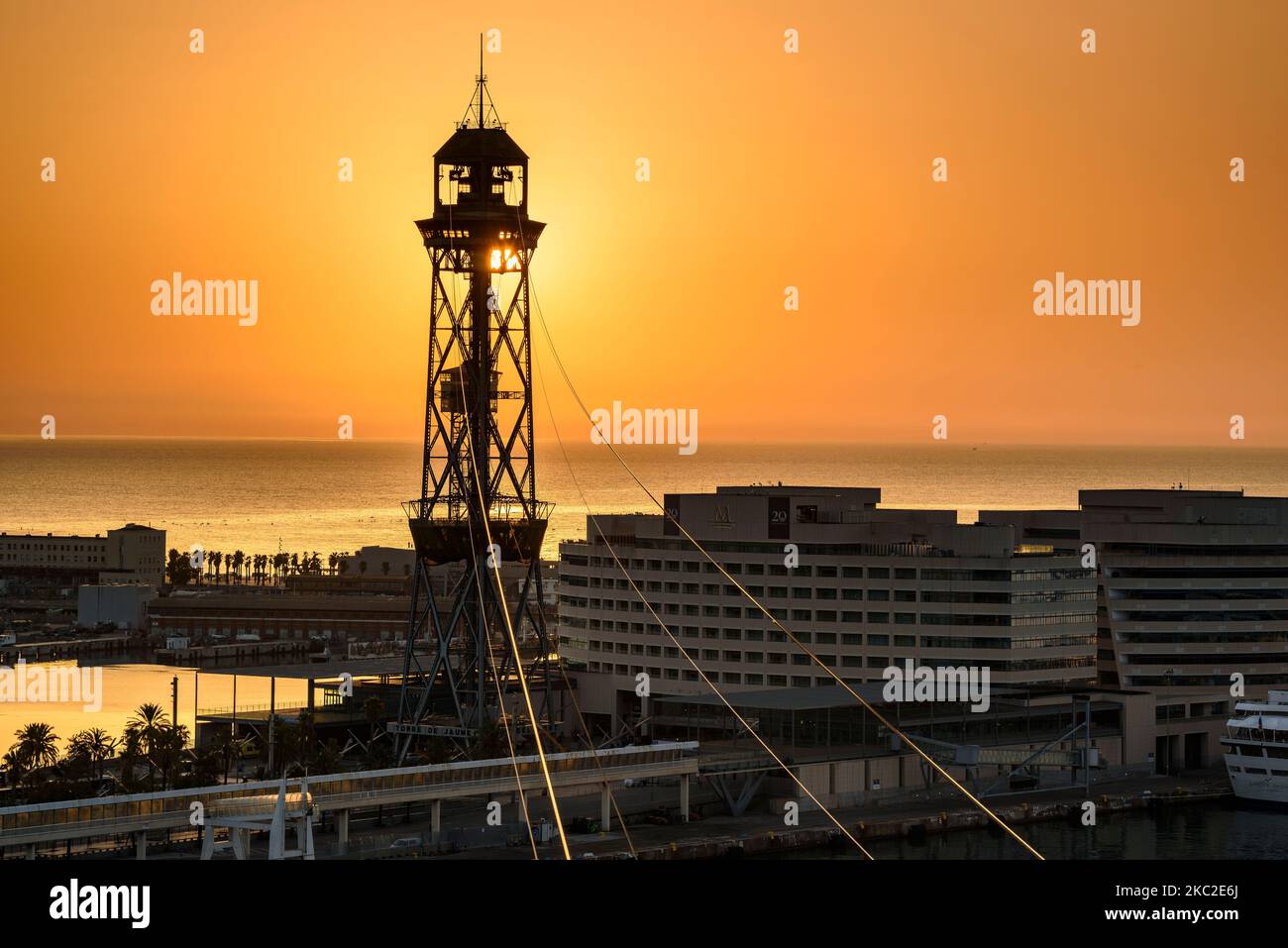 Port Vell (the Old Harbor) and Jaume I tower in Barcelona at sunrise (Barcelona, Catalonia, Spain) ESP: Port Vell (puerto viejo) y Torre Jaume I, BCN Stock Photo
