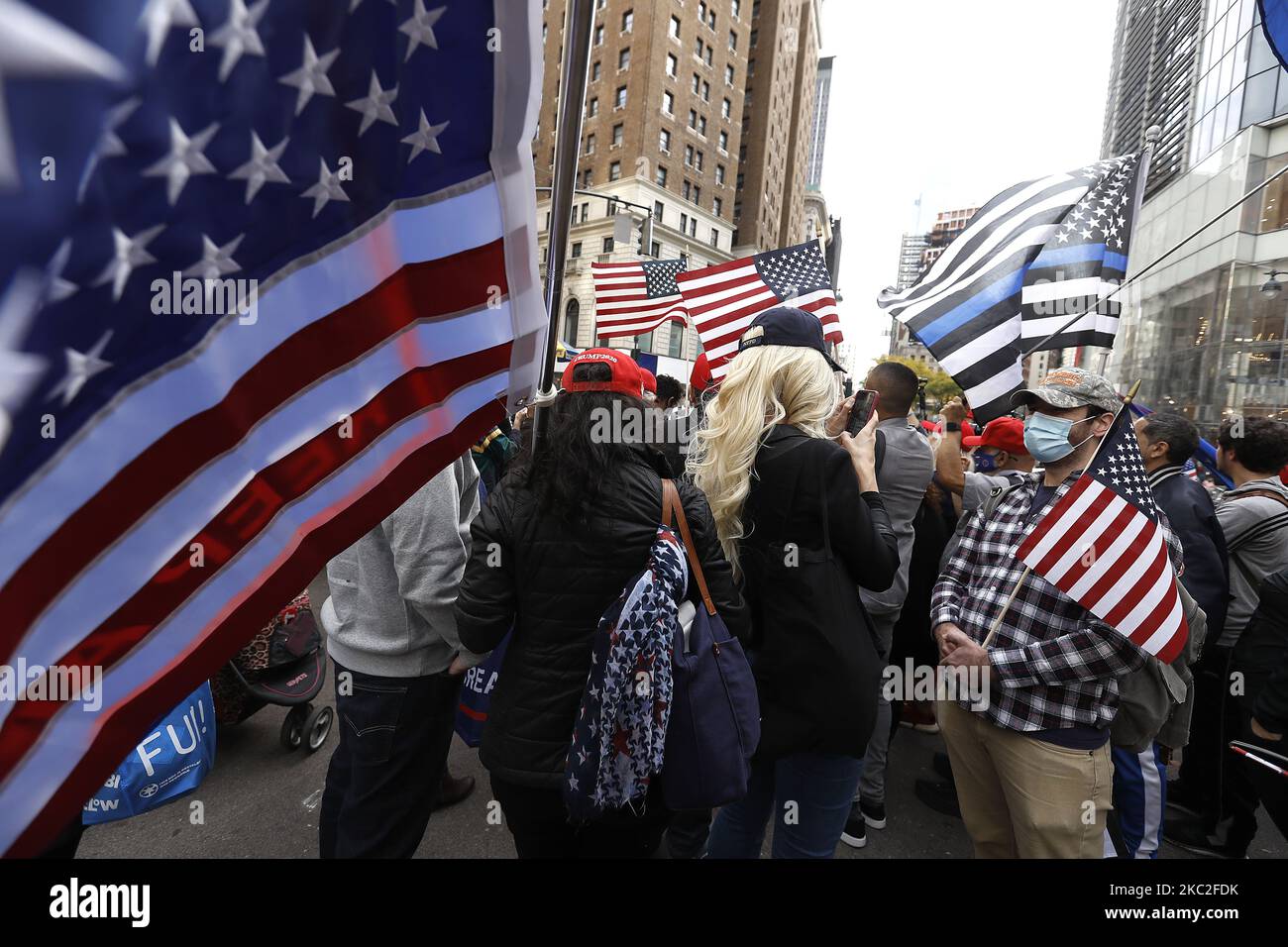 Supporters of President Trump clash with supporters of Joe Biden in Herald Square on October 24, 2020 in New York City. With the November 3rd Election Day fast approaching, tensions and verbal confrontations were heard from both party voters as they yelled slogans across 34th Street. (Photo by John Lamparski/NurPhoto) Stock Photo