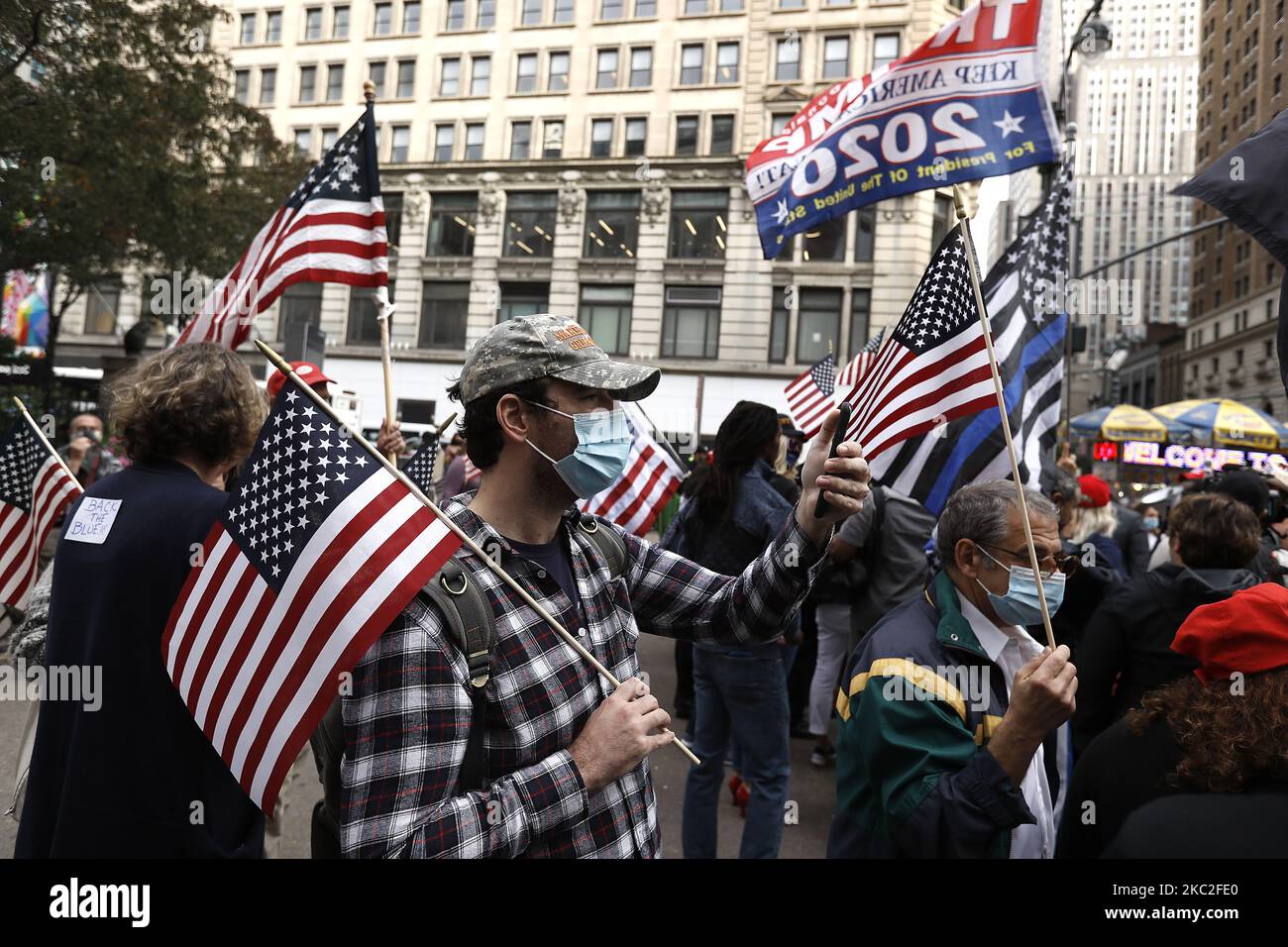 Supporters of President Trump clash with supporters of Joe Biden in Herald Square on October 24, 2020 in New York City. With the November 3rd Election Day fast approaching, tensions and verbal confrontations were heard from both party voters as they yelled slogans across 34th Street. (Photo by John Lamparski/NurPhoto) Stock Photo