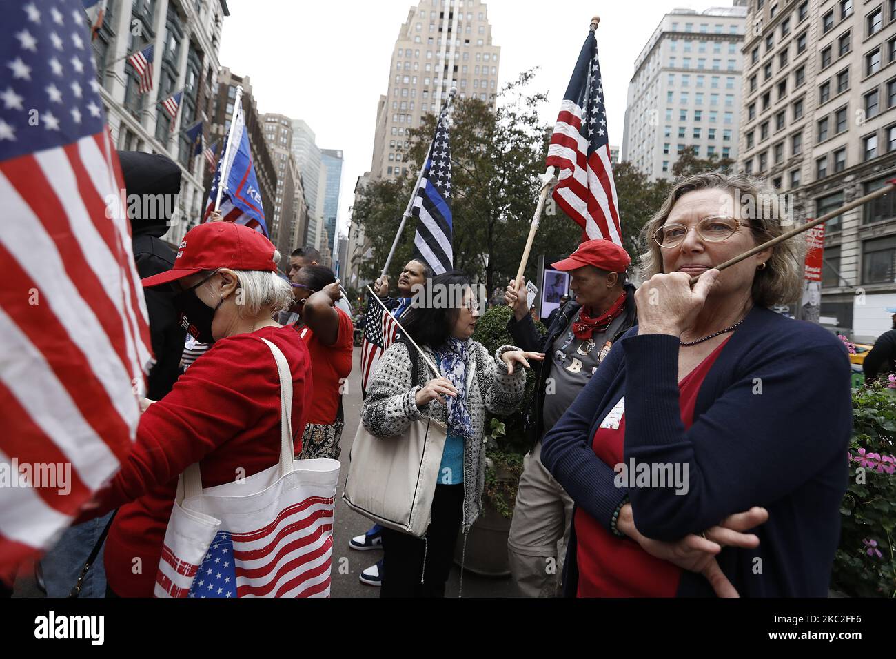 Supporters of President Trump clash with supporters of Joe Biden in Herald Square on October 24, 2020 in New York City. With the November 3rd Election Day fast approaching, tensions and verbal confrontations were heard from both party voters as they yelled slogans across 34th Street. (Photo by John Lamparski/NurPhoto) Stock Photo