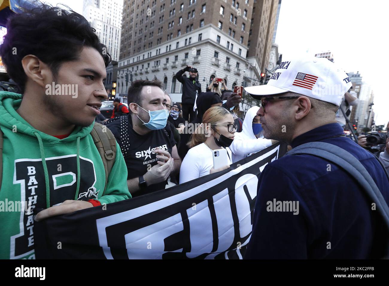 Supporters of President Trump clash with supporters of Joe Biden in Herald Square on October 24, 2020 in New York City. With the November 3rd Election Day fast approaching, tensions and verbal confrontations were heard from both party voters as they yelled slogans across 34th Street. (Photo by John Lamparski/NurPhoto) Stock Photo