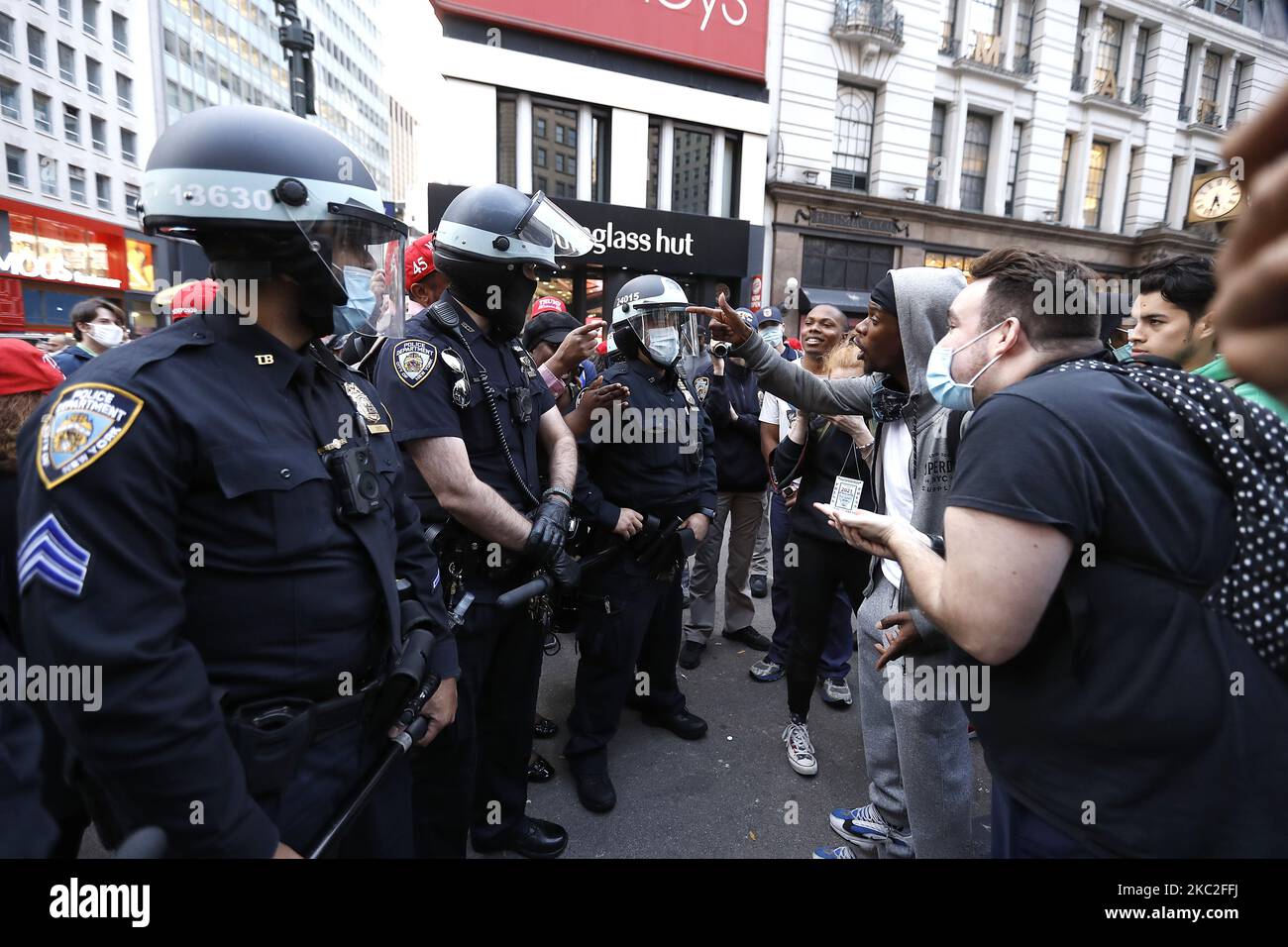 Supporters of President Trump clash with supporters of Joe Biden in Herald Square on October 24, 2020 in New York City. With the November 3rd Election Day fast approaching, tensions and verbal confrontations were heard from both party voters as they yelled slogans across 34th Street. (Photo by John Lamparski/NurPhoto) Stock Photo