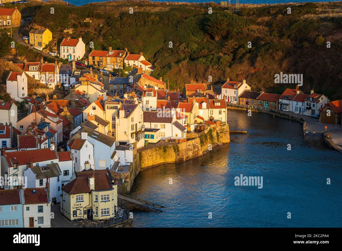 Early morning light at Staithes Harbour North Yorkshire England Stock Photo