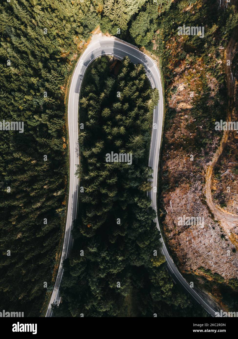 Vertical shot curved road hi-res stock photography and images - Alamy