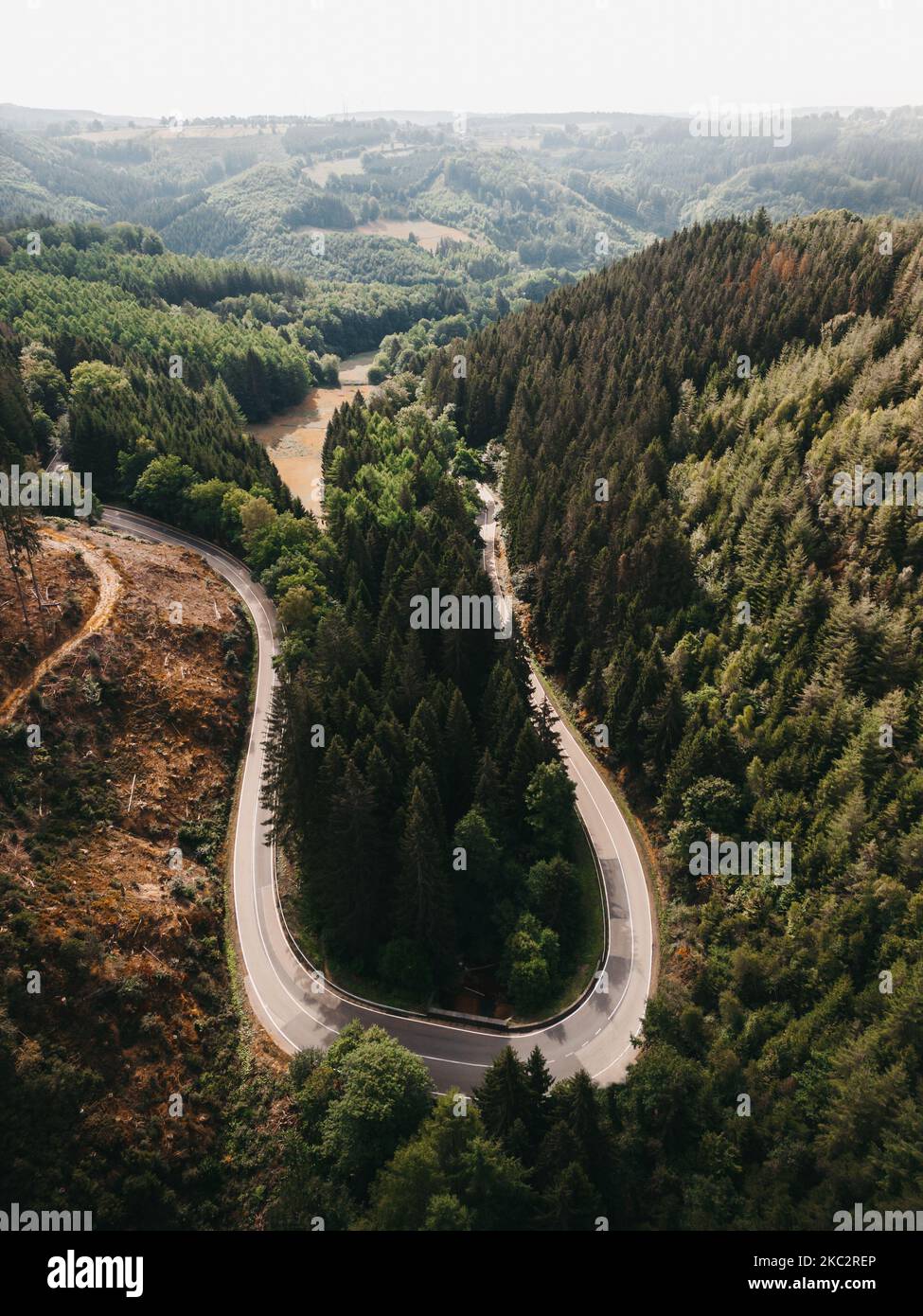 Vertical shot curved road hi-res stock photography and images - Alamy