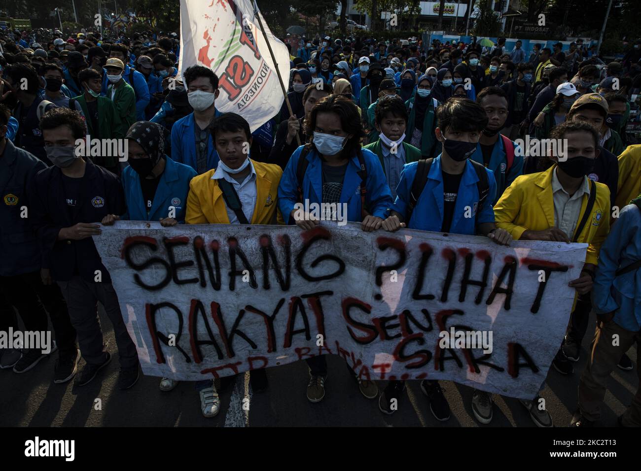 Jakarta, Indonesia, 28 October 2020 : Students demonstrant with banner said J'are you happy people of Indonesia miserable?'. Thousands of students held demonstration near Jakarta palace at merdeka street to protest the legallization of Omnibus Law. (Photo by Donal Husni/NurPhoto) Stock Photo