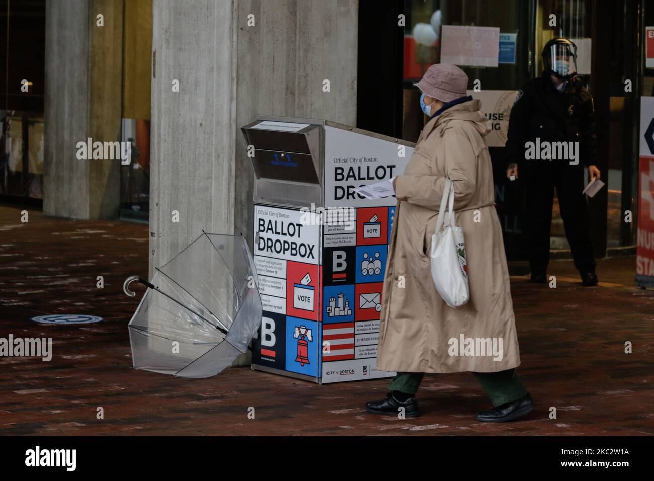 An elderly woman drops her ballot at Boston CIty Hall Plaza in Boston, MA, 28 February 2020 (Photo by Anik Rahman/NurPhoto) Stock Photo