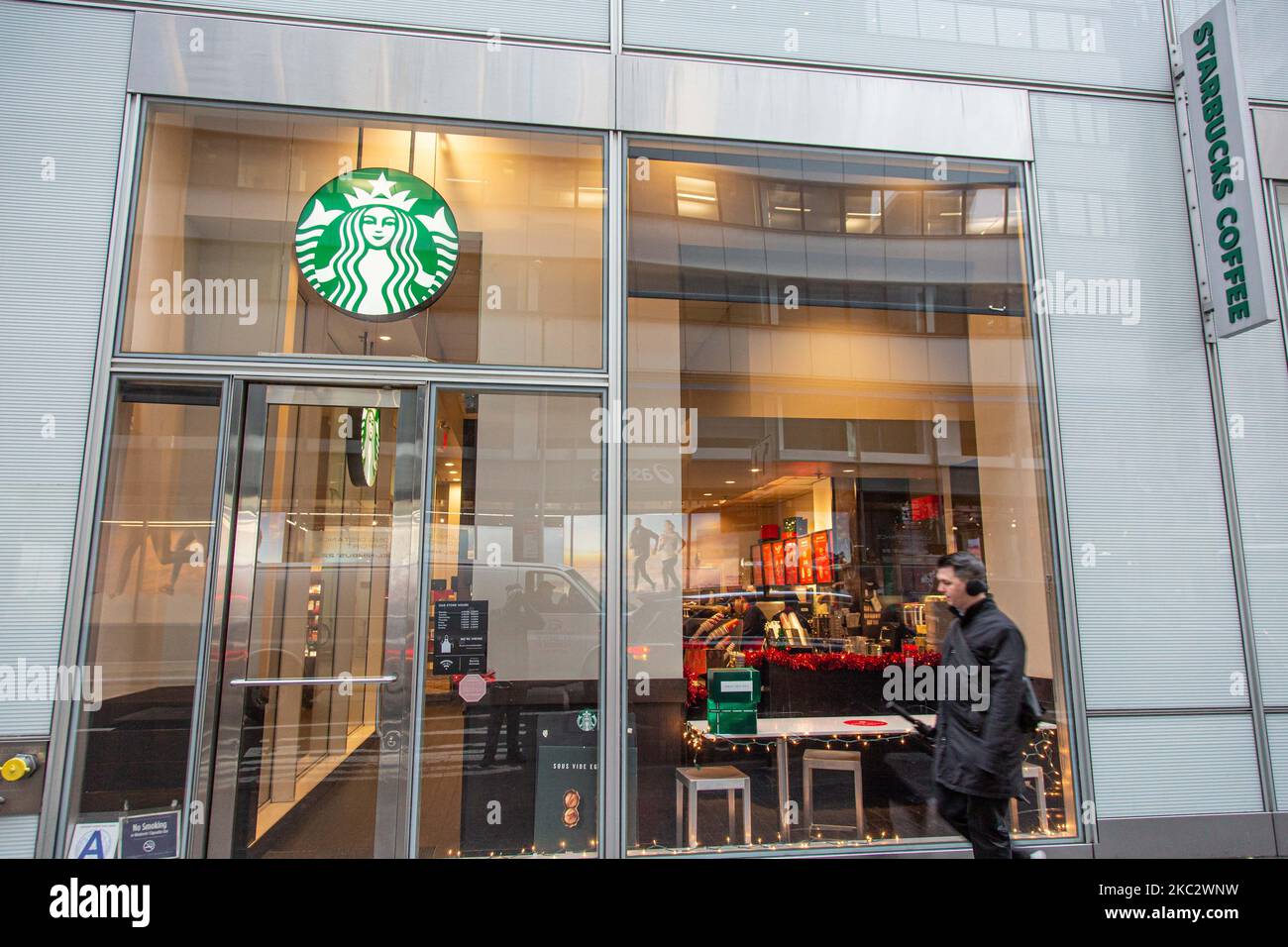 A store front of a Starbucks Coffee shop located in Midtown Manhattan