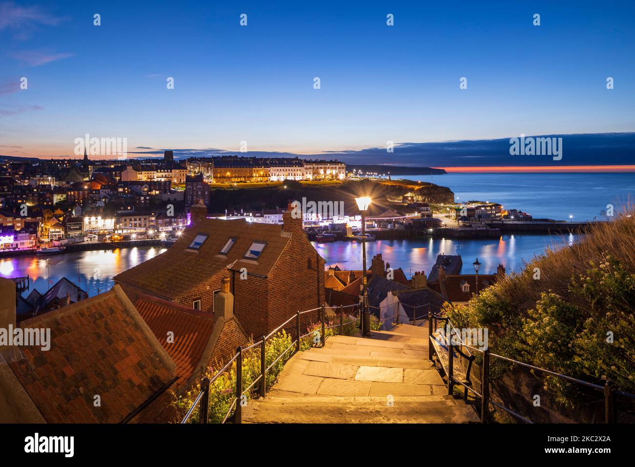 Looking down The 199 Steps to the Harbour Whitby North Yorkshire England at twilight Stock Photo