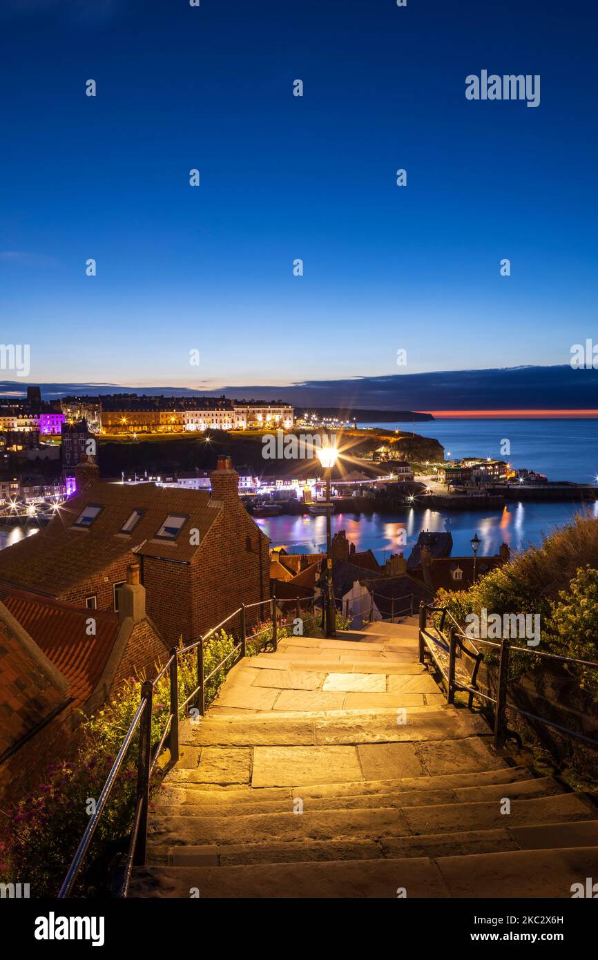 Looking down The 199 Steps to the Harbour Whitby North Yorkshire England at twilight Stock Photo