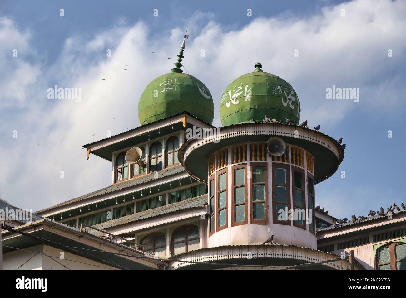 Allah-U-Akbar and Muhammad (PBUH) written on the tomb of a Shrine in the town of District Baramulla, Jammu and Kashmir, India on 30 October 2020. As the anger grows in Jammu and Kashmir over the new land laws, which allow any Indian citizen to buy land in the Union territory, the separatist Hurriyat Conference on Wednesday broke its silence and called for a one-day shutdown on October 31 to protest the â€œanti-people movesâ€ by New Delhi. (Photo by Nasir Kachroo/NurPhoto) Stock Photo