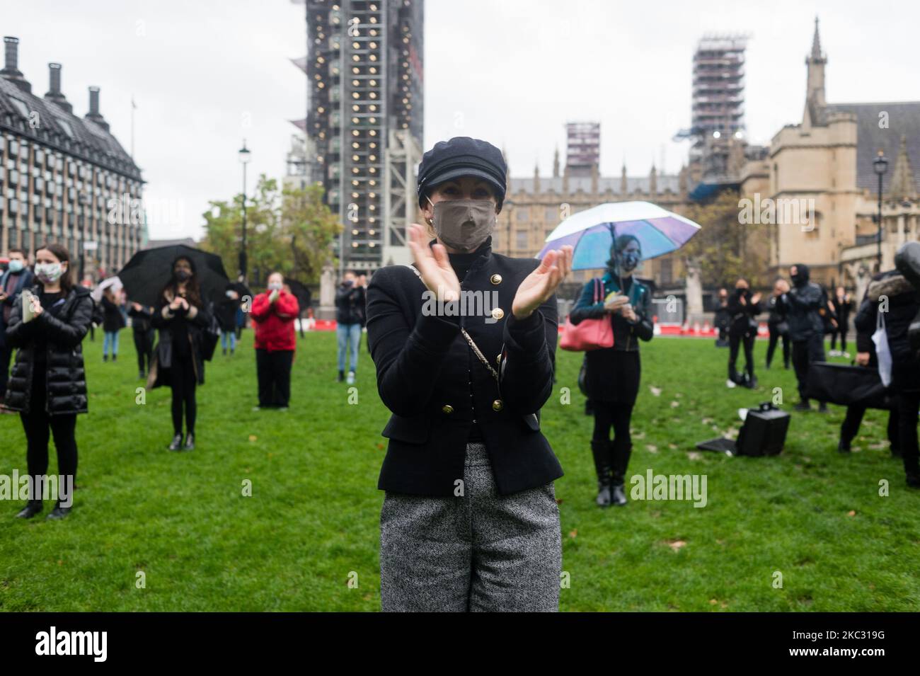 West End Waiting (WEW) are creating “Singing Flash Mob” at midday at Parliament Square on October 31, 2020 in London, United Kingdom. The idea was born as a direct result of Lee’s passion for the industry which generates some £5.6billion a year in the UK, is in decline through lack of Government support in recent months due to the COVID-19 Pandemic. (Photo by Maciek Musialek/NurPhoto) Stock Photo