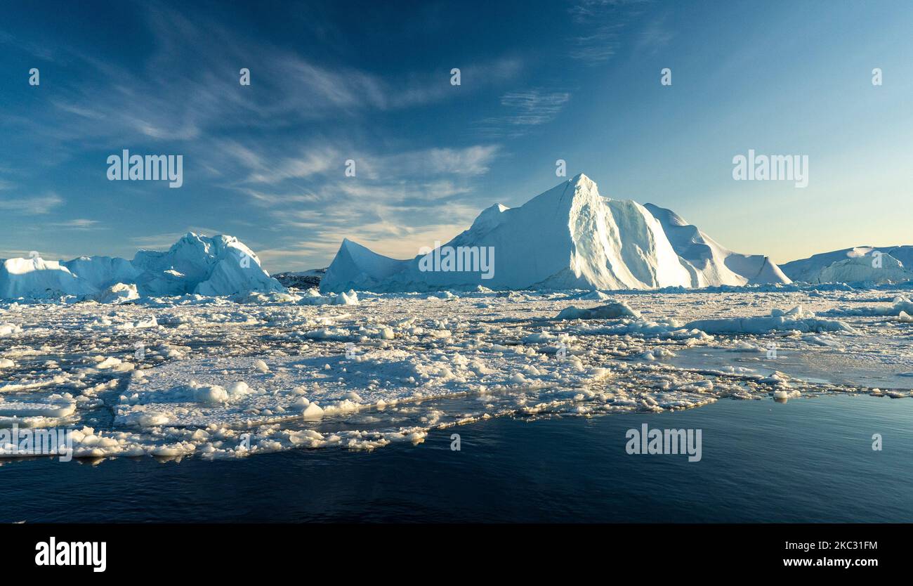Icebergs near Ilulissat, Greenland. Climate change is having a profound ...