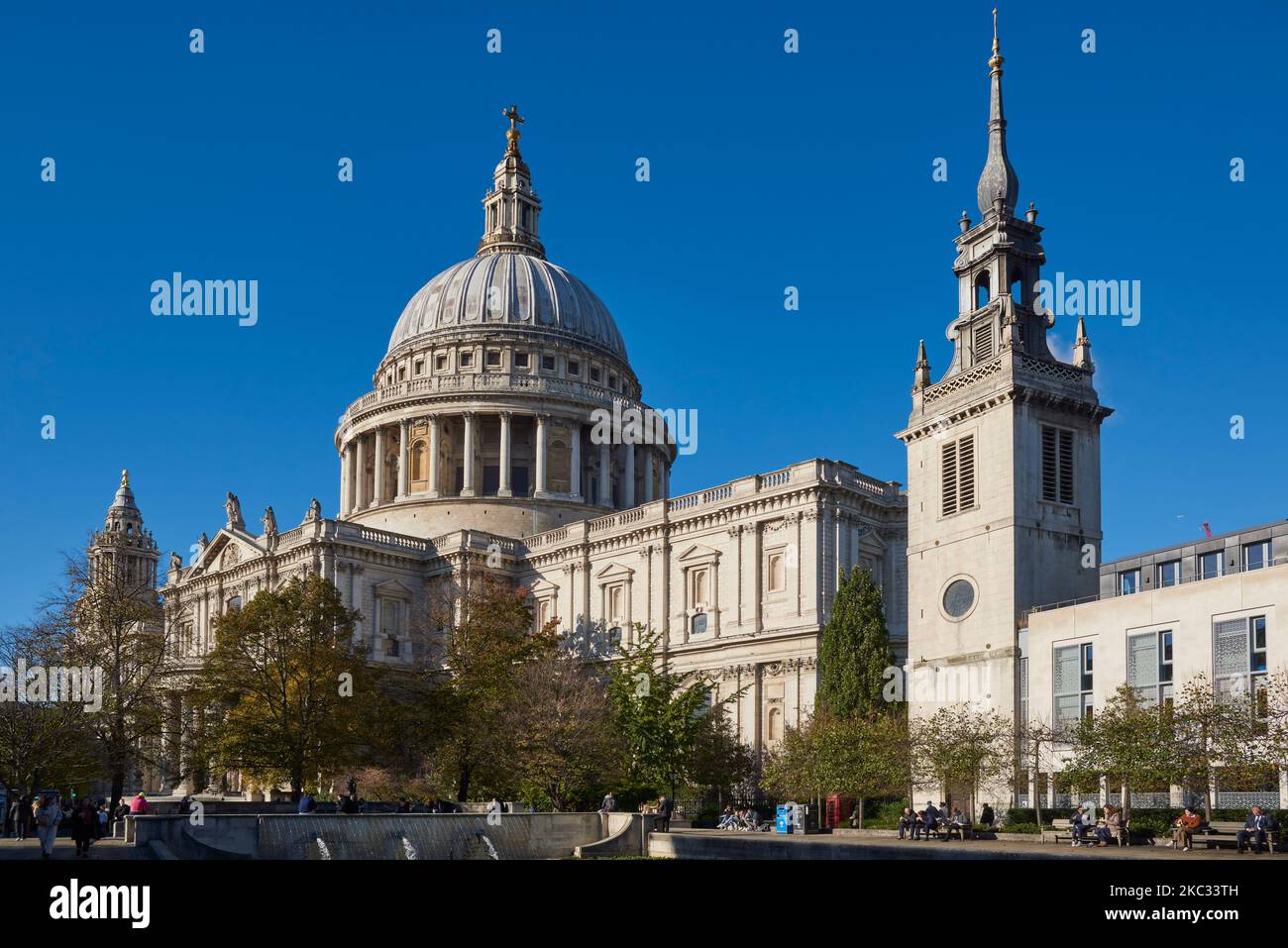 St Paul's Cathedral in the City of London, UK, with the tower of St Augustine Watling Street in the foreground Stock Photo