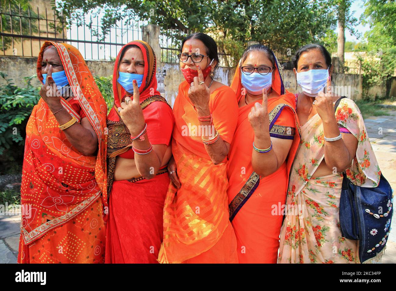 Jaipur Voters show their finger marked with indelible ink after casting vote during the
