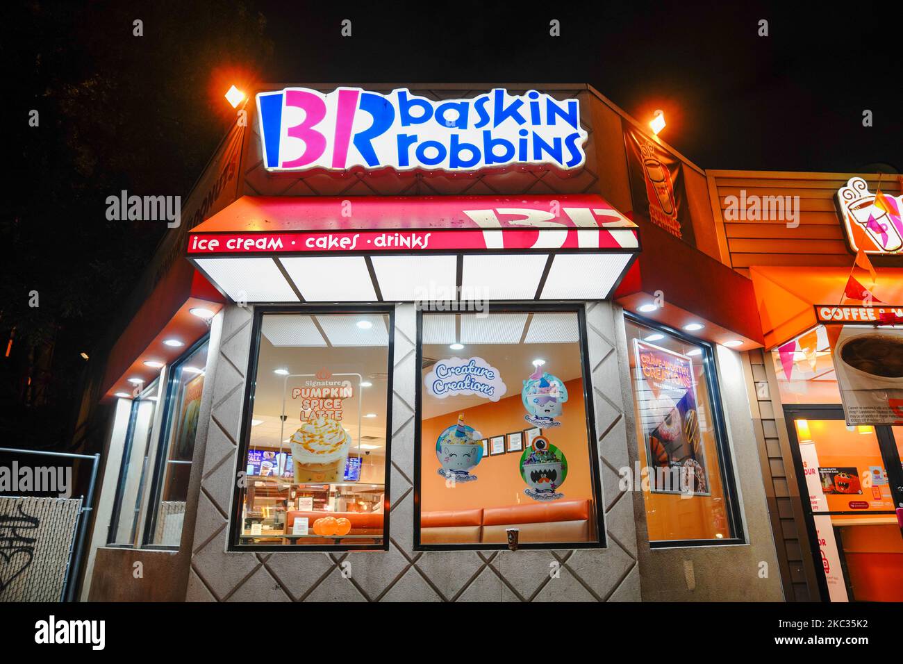 Dunkin' Donuts sign at their Woodside, Queens. Dunkin Donuts / Baskin