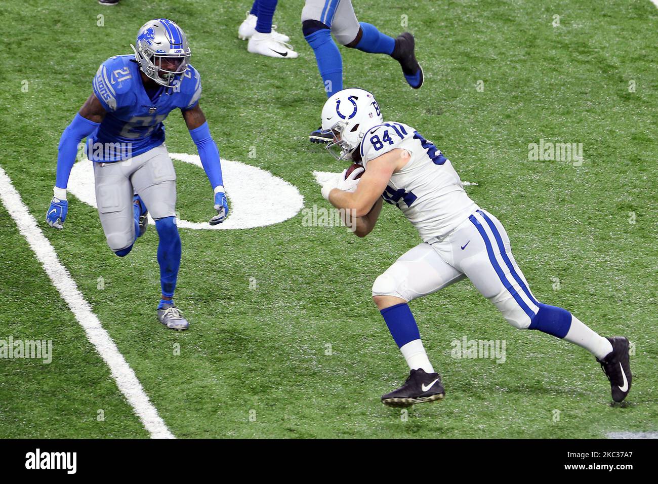 Indianapolis Colts tight end Jack Doyle (84) carries the ball under the pressure of Detroit Lions defensive back Tracy Walker (21) during the second half of an NFL football game against the Detroit Lions in Detroit, Michigan USA, on Sunday, November 1, 2020. (Photo by Amy Lemus/NurPhoto) Stock Photo
