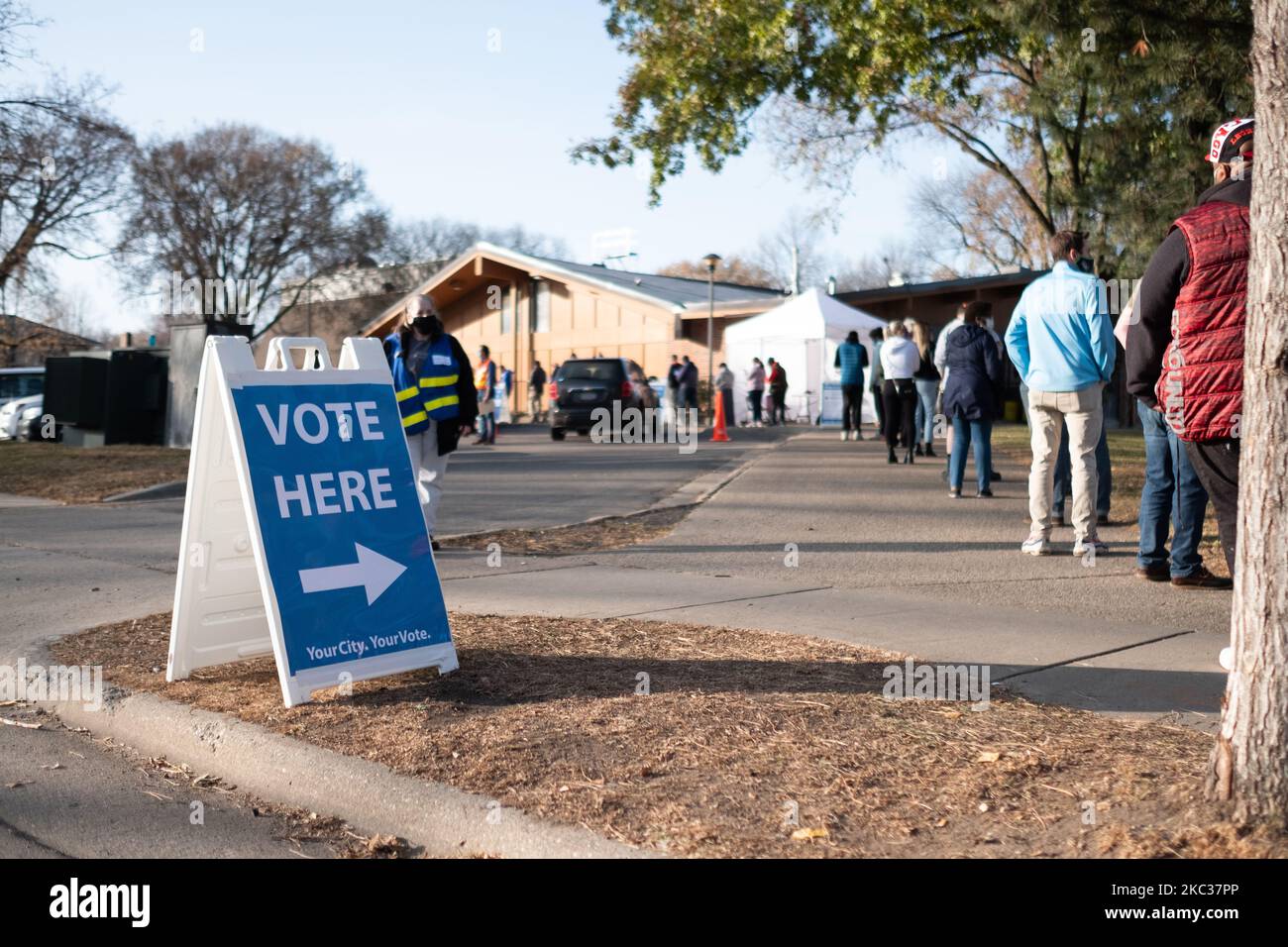 Minneapolis voters wait in line to vote early, in Minneapolis, United