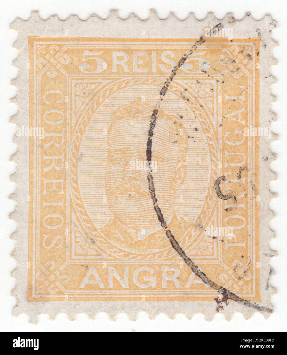 ANGRA - 1892: An 5 reis yellow postage stamp showing portrait of Dom Carlos I, known as the Diplomat, the Martyr, and the Oceanographer, among many other names, was the King of Portugal from 1889 until his assassination in 1908 Stock Photo