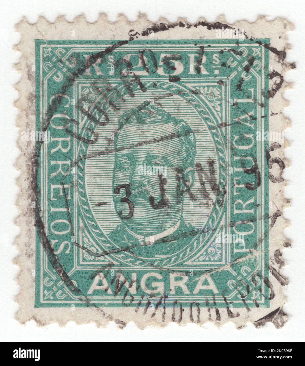 ANGRA - 1892: An 5 reis yellow postage stamp showing portrait of Dom Carlos I, known as the Diplomat, the Martyr, and the Oceanographer, among many other names, was the King of Portugal from 1889 until his assassination in 1908 Stock Photo