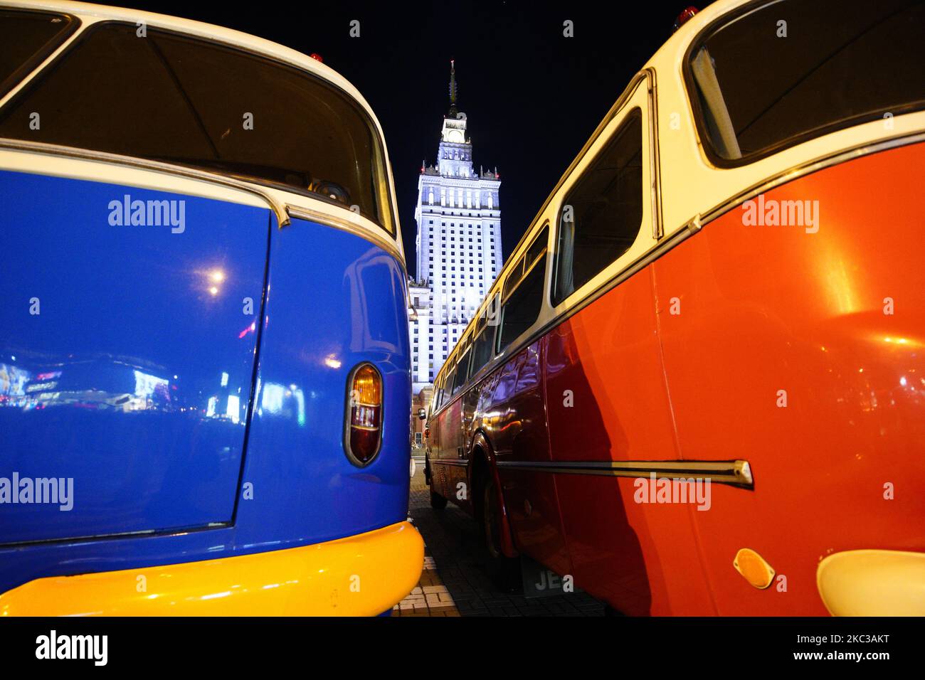 Jelcz 043 buses also called "pickles" are seen parked in front of the Palace of Culture and