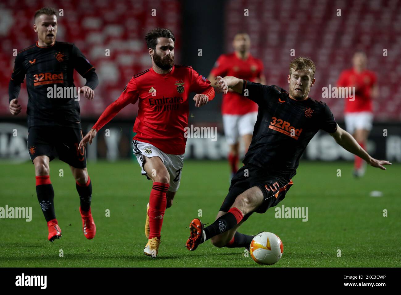 Rafa Silva of SL Benfica (C ) vies with Filip Helander of Rangers FC during the UEFA Europa League group D football match between SL Benfica and Rangers FC at the Luz stadium in Lisbon, Portugal on November 5, 2020. (Photo by Pedro FiÃºza/NurPhoto) Stock Photo