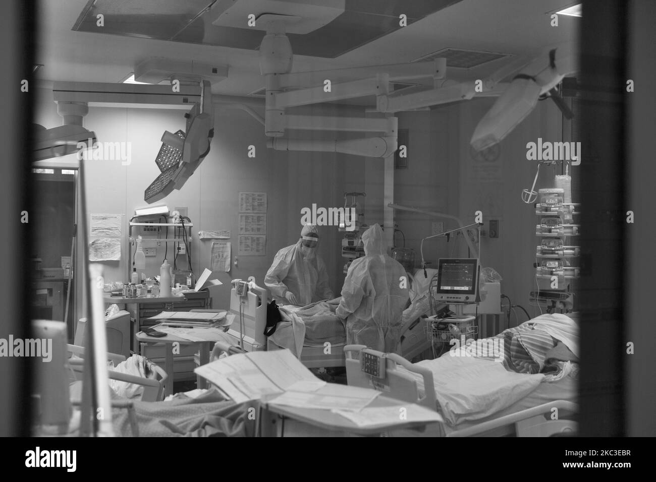 (EDITOR'S NOTE: Image was converted to black and white) A view inside the intensive care unit (ICU) in the COVID 19 department at the Istituto Clinico Casalpalocco hospital in Rome, Italy on 6th November 2020, Italy. The Italian Government is adopting the measure of a soft lockdown, different for any region. The number of new Infections due to the COVID-19 rised up to 35000 new cases in the last day. (Photo by Matteo Trevisan/NurPhoto) Stock Photo