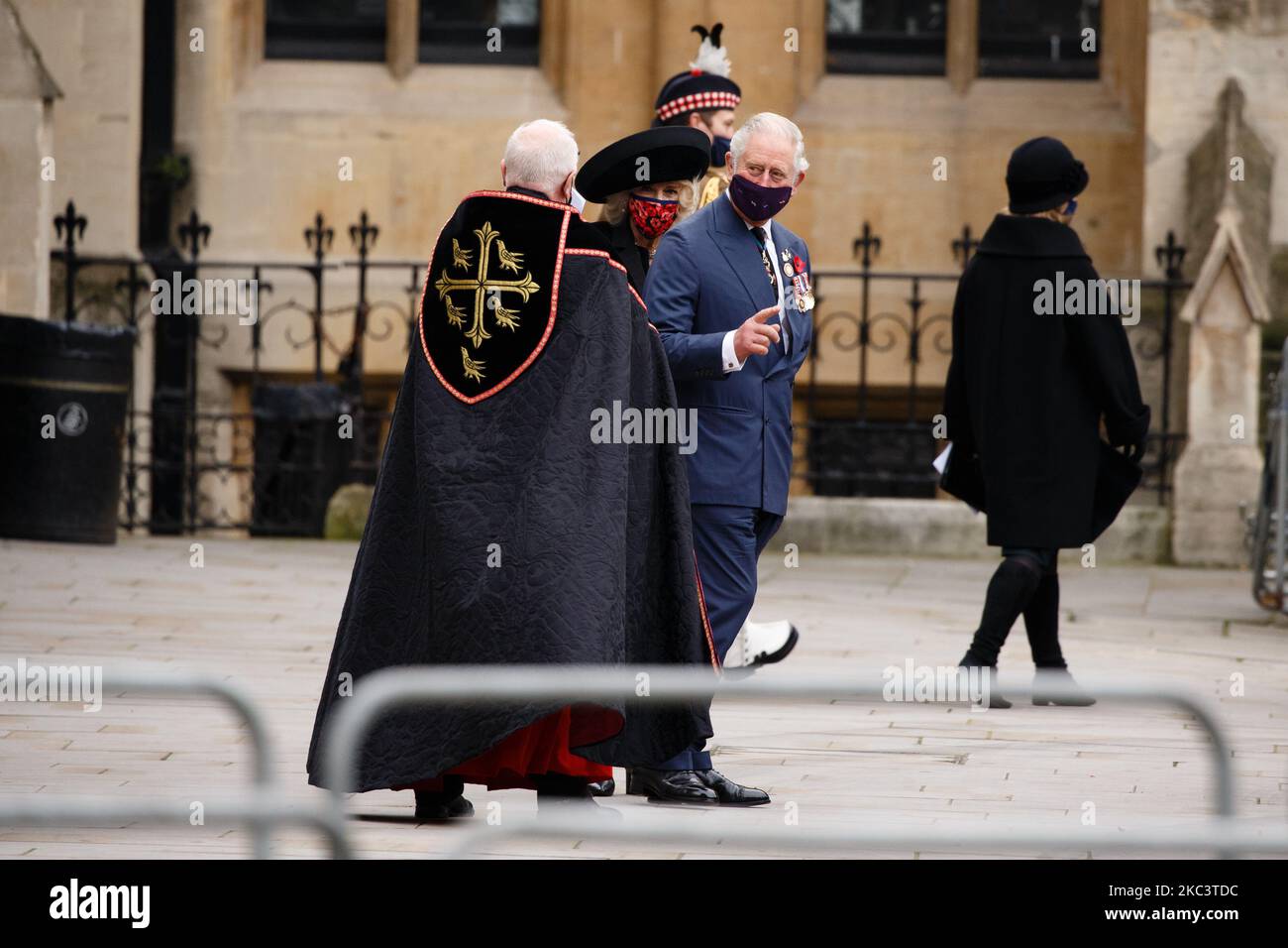 Prince Charles, the Prince of Wales, and Camilla, Duchess of Cornwall, wear face masks as they leave an Armistice Day service at Westminster Abbey in London, England, on November 11, 2020. (Photo by David Cliff/NurPhoto) Stock Photo