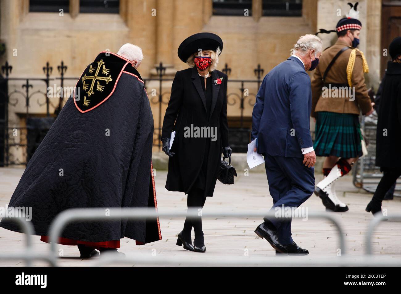 Prince Charles, the Prince of Wales, and Camilla, Duchess of Cornwall, wear face masks as they leave an Armistice Day service at Westminster Abbey in London, England, on November 11, 2020. (Photo by David Cliff/NurPhoto) Stock Photo