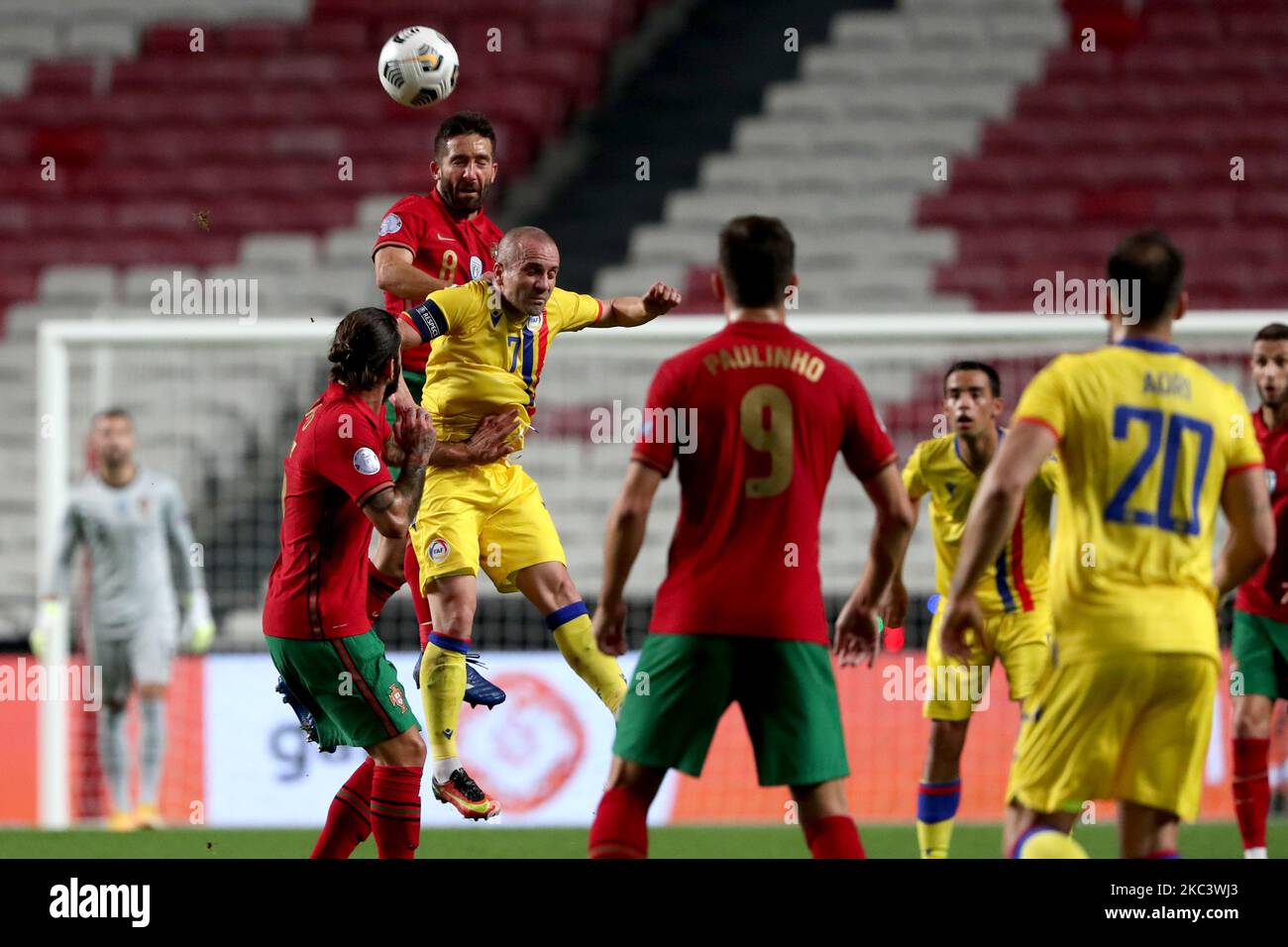 Joao Moutinho of Portugal (top L) heads the ball with Marc Pujol of Andorra during the friendly football match between Portugal and Andorra, at the Luz stadium in Lisbon, Portugal, on November 11, 2020. (Photo by Pedro FiÃºza/NurPhoto) Stock Photo