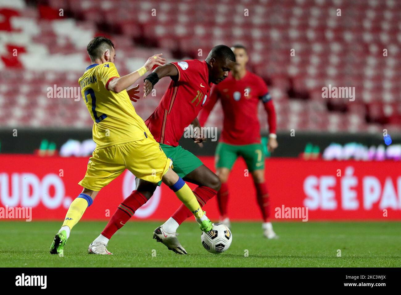 William Carvalho of Portugal (R ) vies with Cristian Martinez of Andorra during the friendly football match between Portugal and Andorra, at the Luz stadium in Lisbon, Portugal, on November 11, 2020. (Photo by Pedro FiÃºza/NurPhoto) Stock Photo