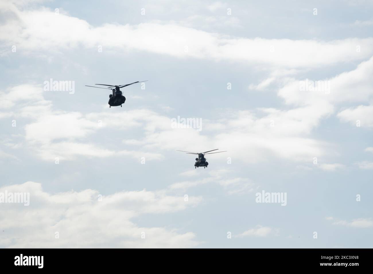 Boeing CH-47 Chinook during an air show. Greek Air Force twin-engine lift helicopters flying during the 28 October Oxi Parade in Thessaloniki, Greece. Stock Photo