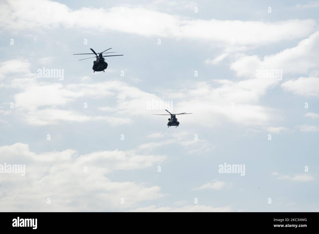 Boeing CH-47 Chinook during an air show. Greek Air Force twin-engine lift helicopters flying during the 28 October Oxi Parade in Thessaloniki, Greece. Stock Photo
