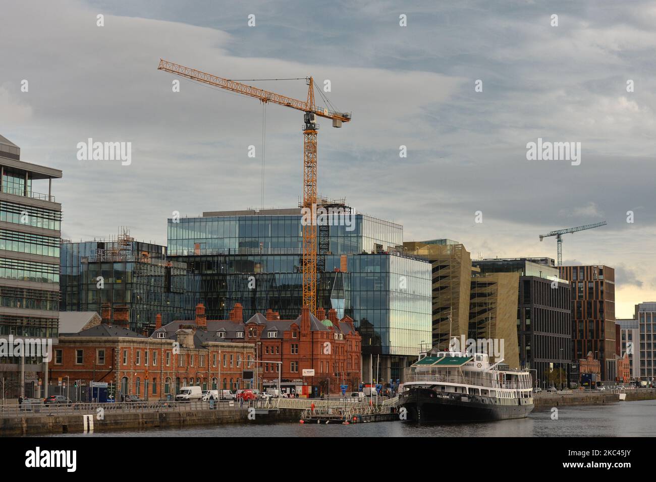A view of the MV Cill Airne Boat Restaurant-Bar, in front of the construction site of the Salesforce Tower, next to the building of the Central Bank new HQ in Dublins Docklands. On Tuesday, November 17, 2020, in Dublin, Ireland. (Photo by Artur Widak/NurPhoto) Stock Photo