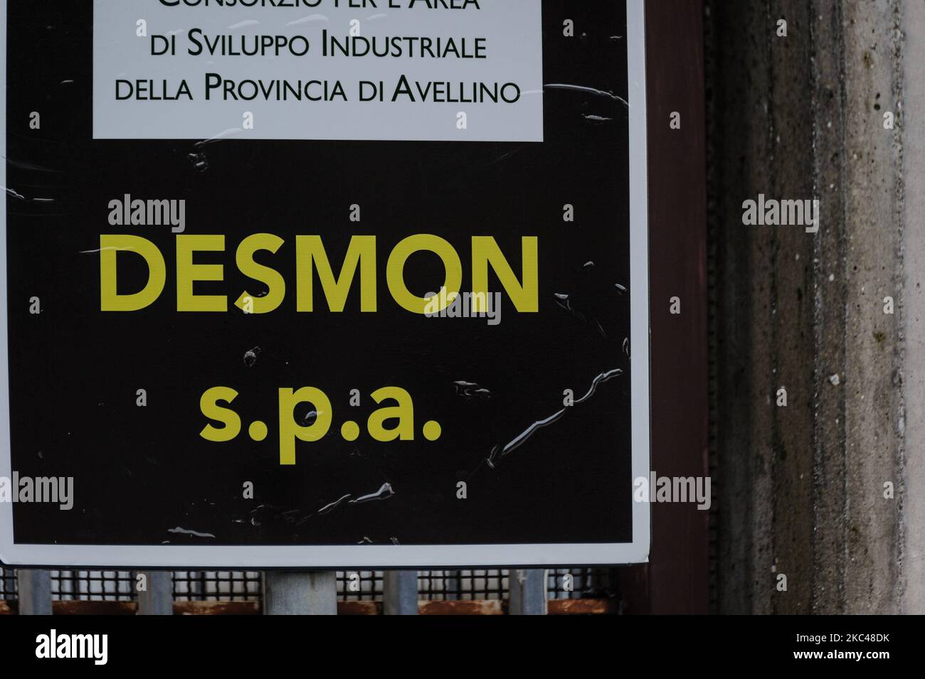 A road sign marking the entrance to the industrial shed of the Italian company Desmon, in Nusco in Avellino, southern Italy, on November 19, 2020. Desmon is a company from southern Italy, and works in the refrigeration sector, and will be the producer of the new transport and refrigerated storage system for the new American vaccine of the company Pfizer against the Covid-19 virus, which requires it to be stored at a temperature of -80 C, an extreme specification that only the Italian company Desmon has been able to complete with its two refrigeration systems, one for transport that manages to  Stock Photo