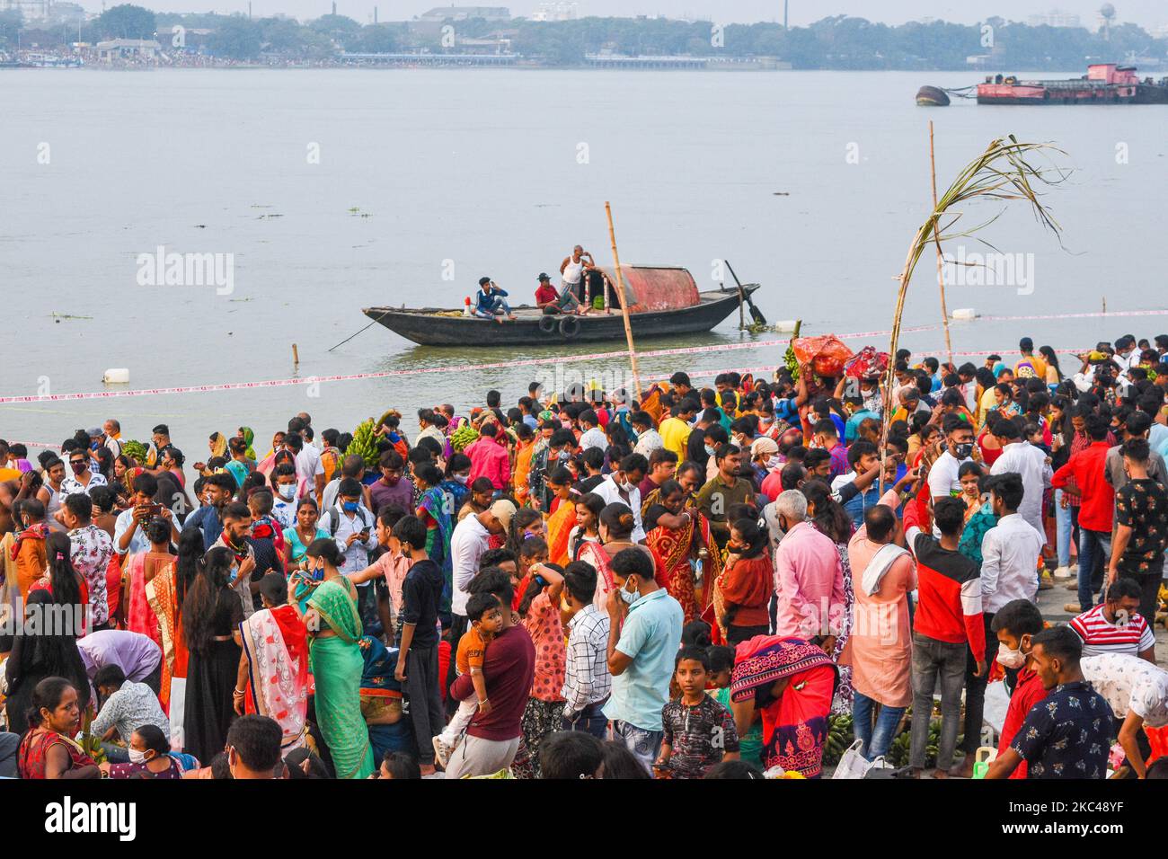 Devotees flocked to river banks in large number , breaking covid ...