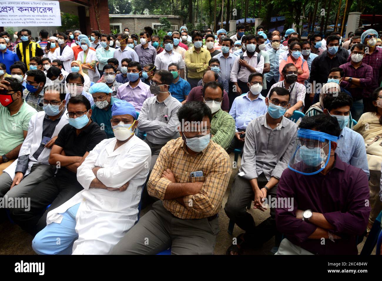 Bangladeshi Doctors wearing facemusk take a part in a protest rally