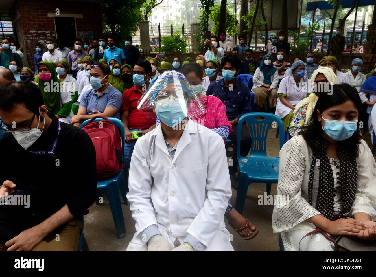 Bangladeshi Doctors wearing facemusk take a part in a protest rally