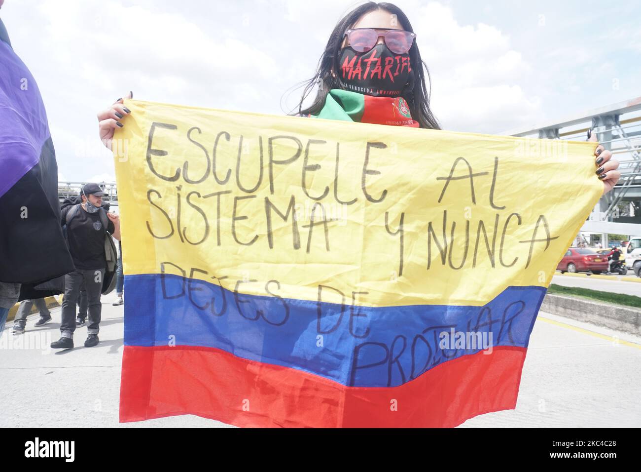 People protest against the government of President Ivan Duque, in Bogota, Colombia, on November 21, 2020. (Photo by Daniel Garzon Herazo/NurPhoto) Stock Photo