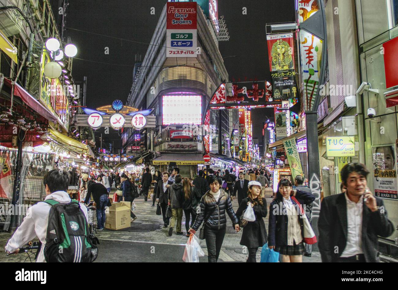 The busy crowded Ameyoko shopping street at night near Ueno station in Tokyo, Japan Stock Photo