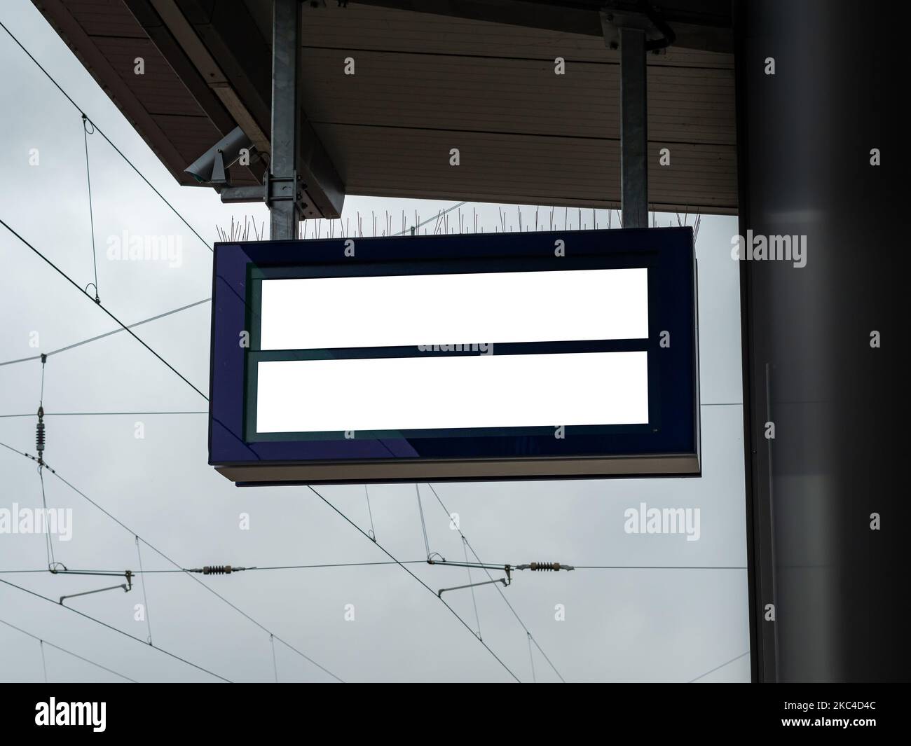 Blank train station departure screen hanging on the roof. Empty display for the use as template or mockup. Important information message for passenger Stock Photo